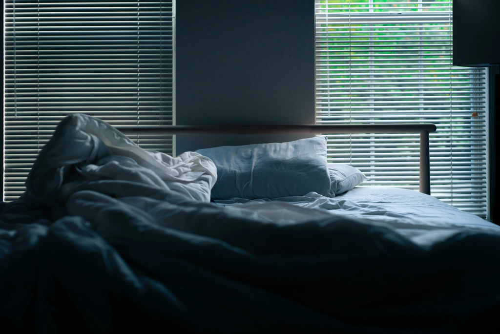 Dark bedroom with window